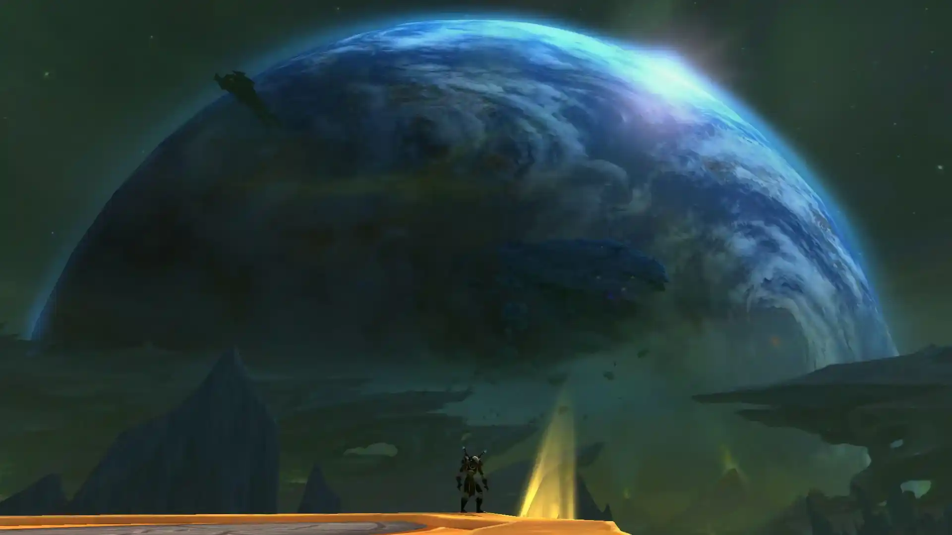 Character standing in front of a huge planet in the background