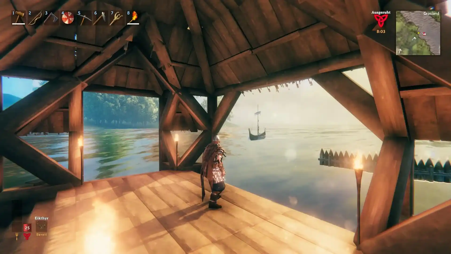 Screenshot at a dock looking at the sea with a boat in the background